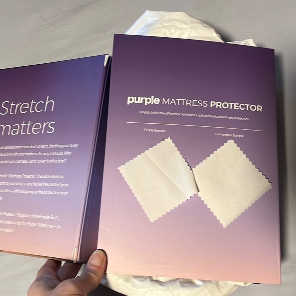 PURPLE MATTRESS PROTECTOR                                OPENED BUT NOT USED.